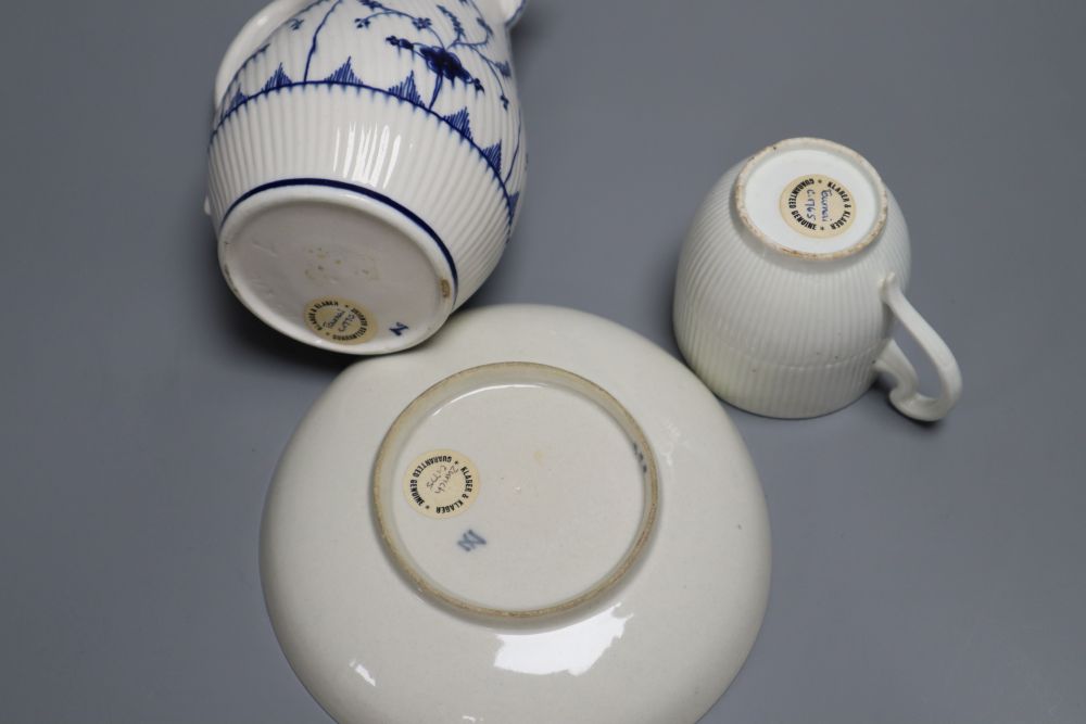 A Tournai covered jug and a similar coffee cup, c.1770 and a similar Zurich puce saucer, c.1775 (4), jug 16cm, ex Klaber & Klaber